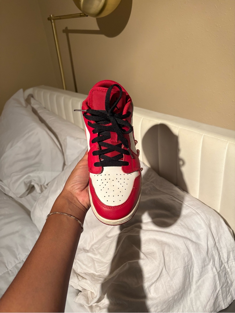 Jordan Red and White High-Top Sneaker with Black Laces